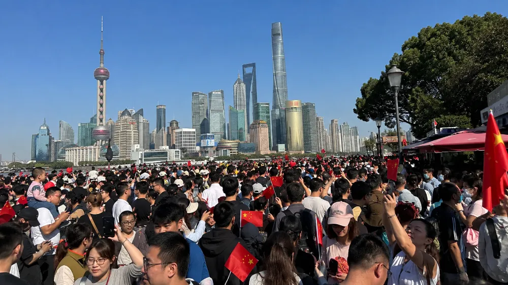 The Bund in Shanghai was packed with tourists during the National Day Golden Week holiday, with the Lujiazui skyline visible in the distance.