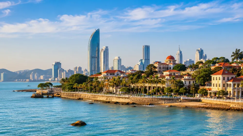 Xiamen coastal city skyline with waterfront promenade, illustrating what to prepare before visiting Xiamen