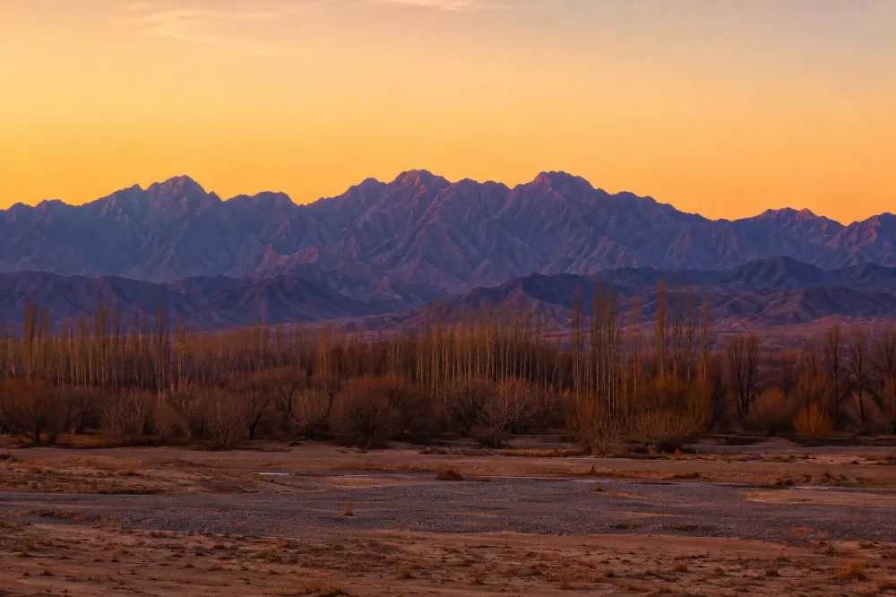 Helan Mountain range in Ningxia at golden hour, a defining landscape of northwest China