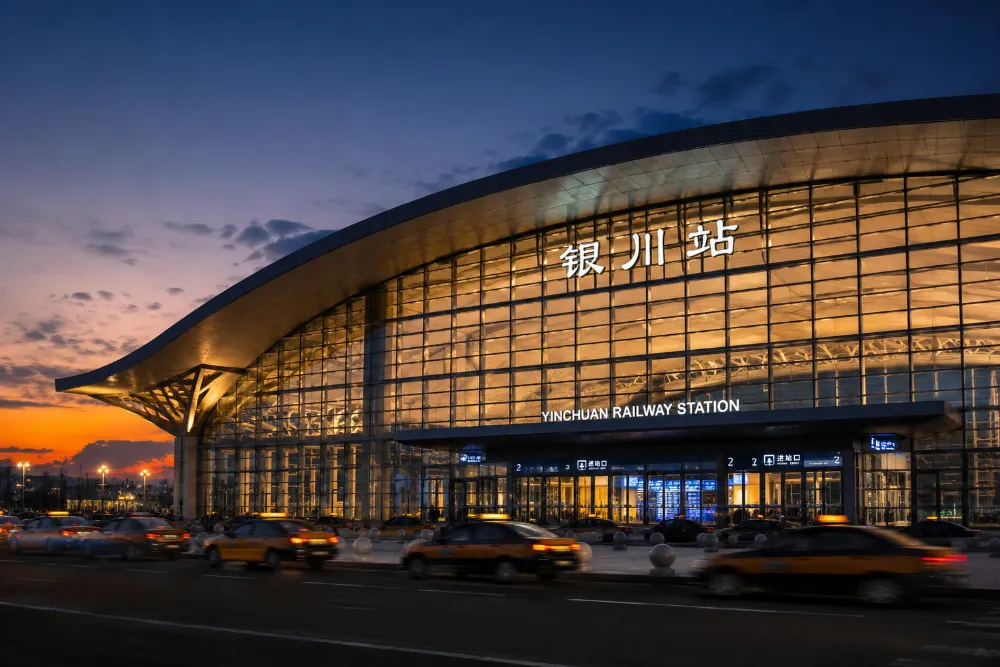 Yinchuan Railway Station at dusk, the main high-speed rail hub for visiting Ningxia