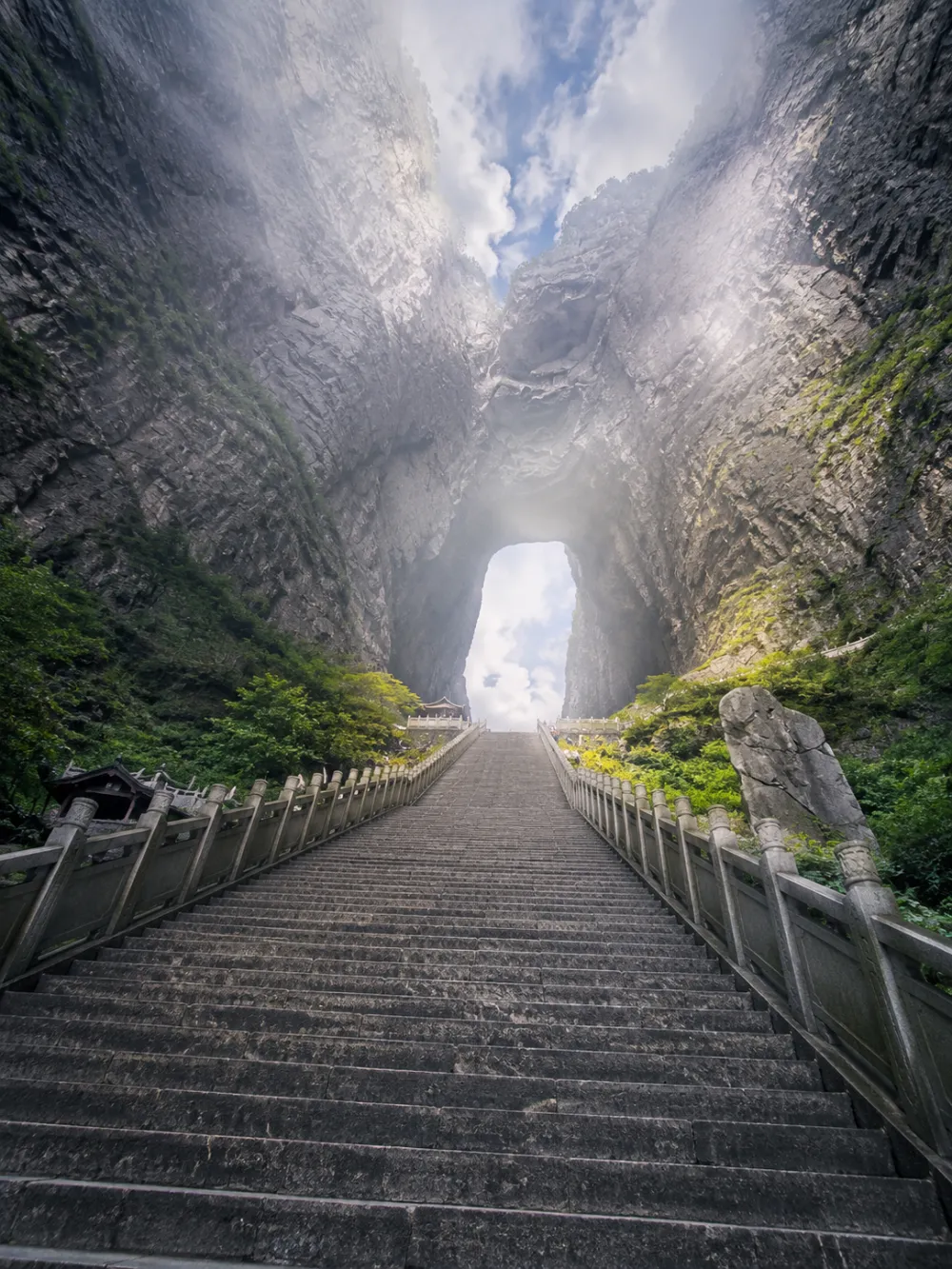 Looking up the 999 steps toward Tianmen Cave arch at Heaven's Gate Mountain Zhangjiajie