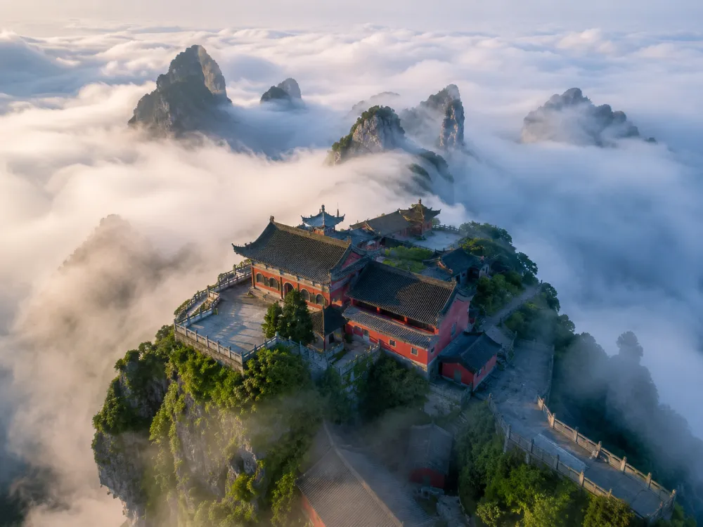 Tianmen Mountain Temple surrounded by sea of clouds on the summit plateau, a highlight for visitors following this Tianmen Mountain guide